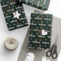 Gifts wrapped in personalized string lights Christmas paper with the name William, tied with twine