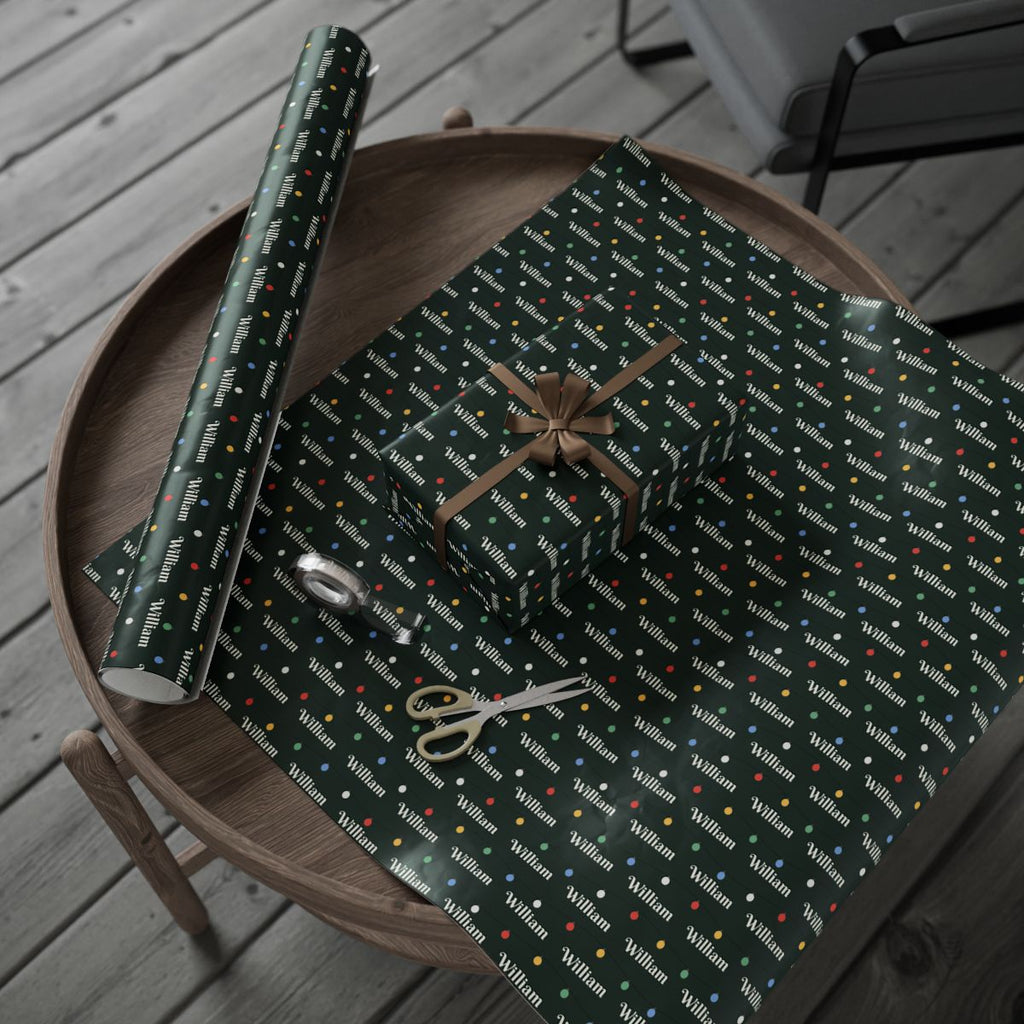 Personalized string lights wrapping paper roll and a wrapped gift on a wooden table